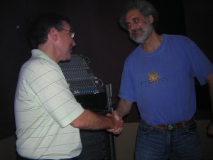 Maurice and Rich shaking hands after 20 years