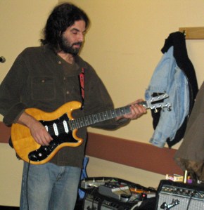 The might neck of Jasons guitar